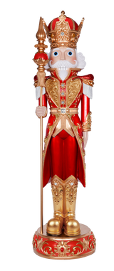 Decorative figure of a king in red and gold attire with a crown and scepter on a white background