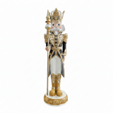 Decorative nutcracker figure with a crown and gold accents on a white background
