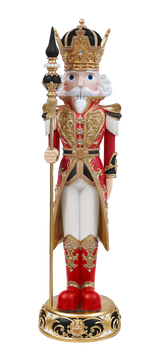 Decorative nutcracker figurine with royal attire and crown on a white background