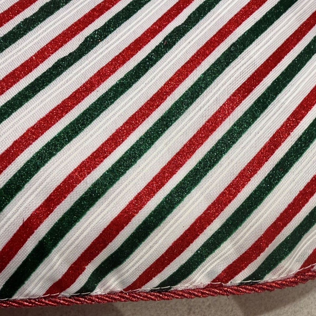 Close-up of red, green, and white striped fabric