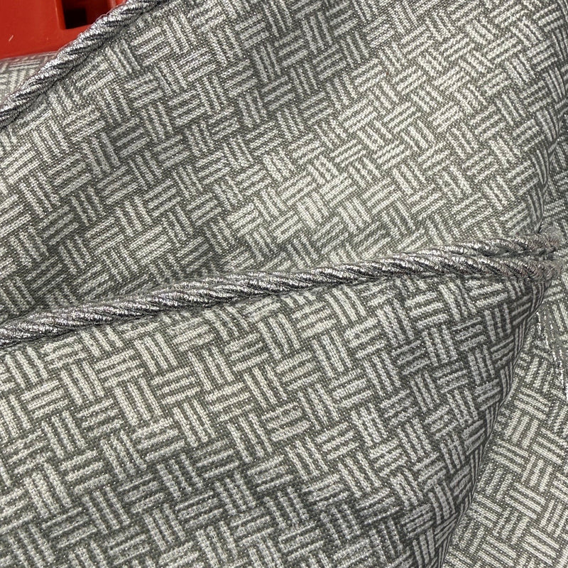 Close-up of a textured fabric with a geometric pattern