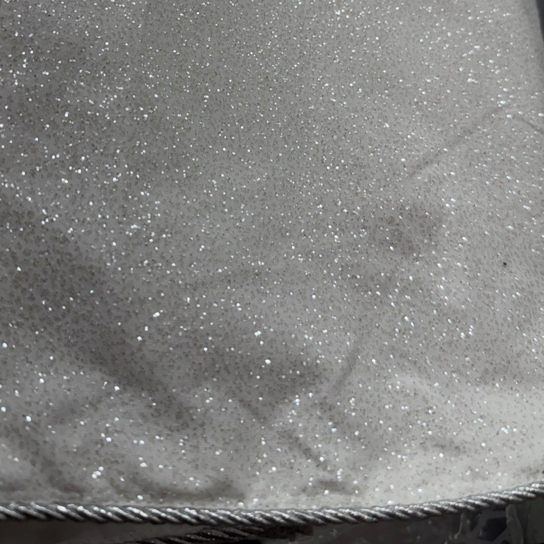 Close-up of silver fabric with glittery specks