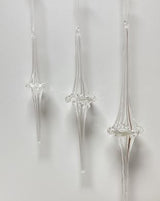 Clear glass pendant lights on a white background