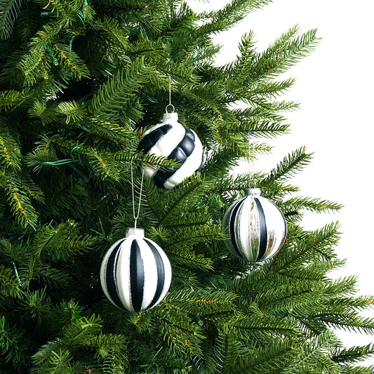 Juego surtido de 12 adornos de bola de cristal con purpurina negra y blanca de 3"