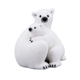 Osa polar de 16" abrazando a su cría