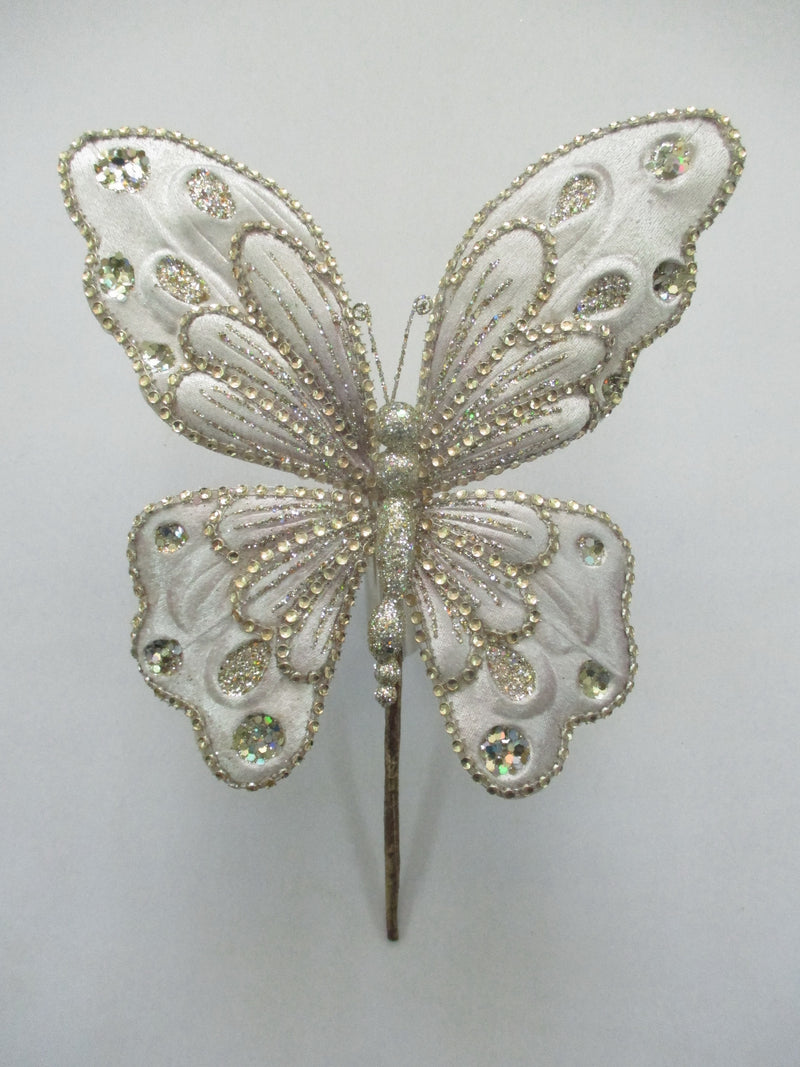 Decorative butterfly with rhinestones on a white background