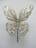 Decorative butterfly with rhinestones on a white background
