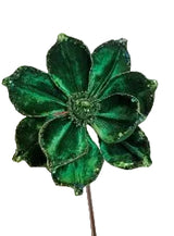 Decorative green flower with glittery texture on a white background