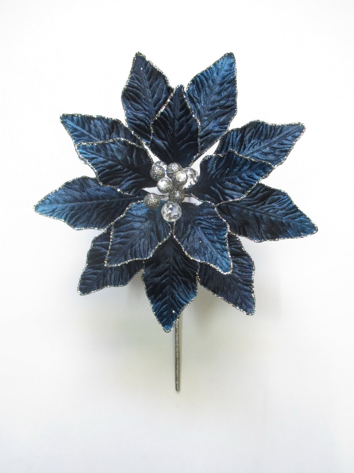 Blue flower-shaped brooch with pearl-like centers on a white background