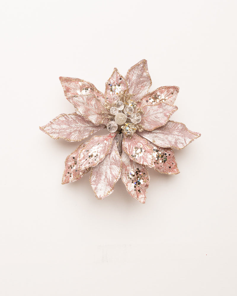Decorative flower with pink and silver glitter on a white background