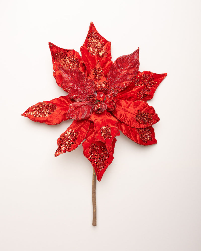 Decorative red leaf with glitter on a white background