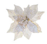 Decorative poinsettia with silver and gold glitter on a white background