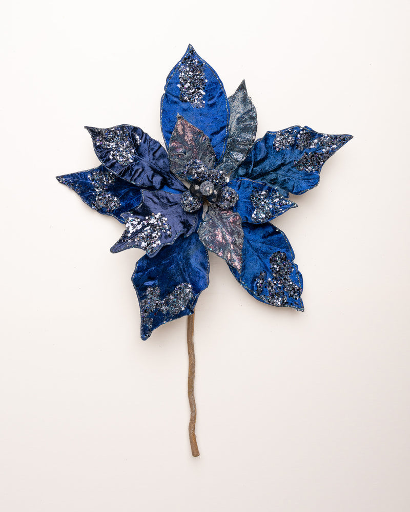 Decorative blue flower with glitter on a white background