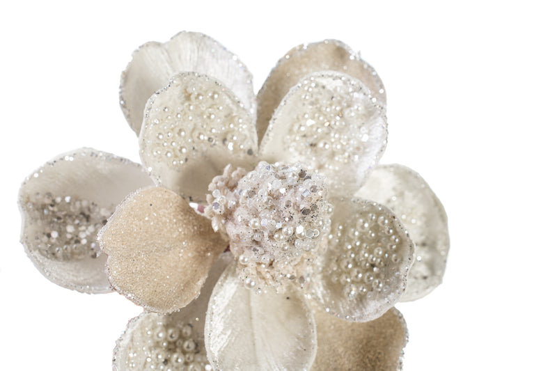 Decorative flower with pearls and beads on a white background