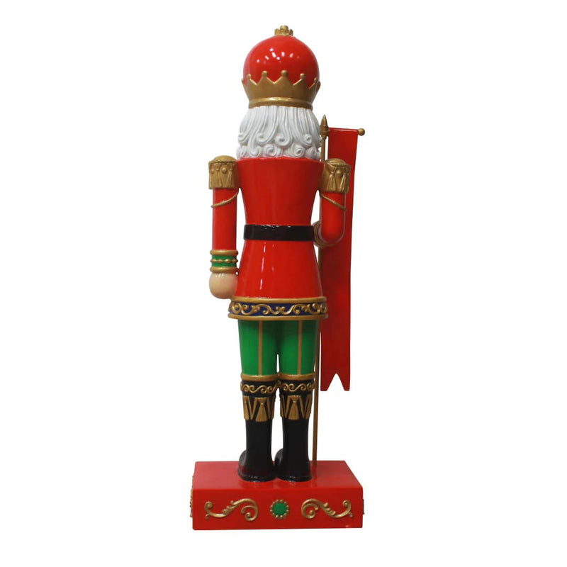 Cascanueces tradicional de 9 pies con letrero de Feliz Navidad