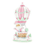 Decorative hot air balloon with a character inside on a white background
