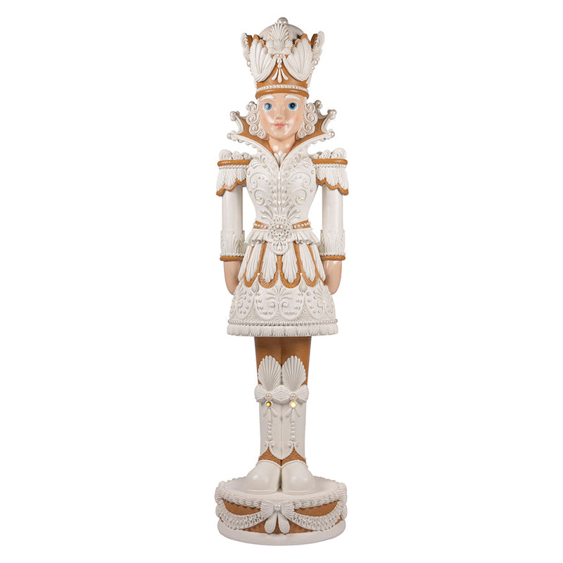 Decorative figurine with intricate design on a white background