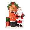 Decorative Christmas mailbox with Santa Claus figure and wreath on a white background