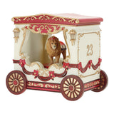 Decorative toy carriage with a lion figure on a white background