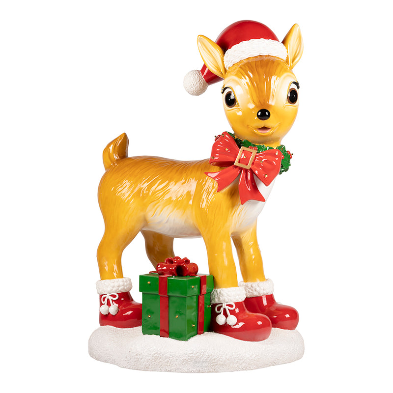 Decorative reindeer figurine with a Santa hat, red bow, and gift box on a white background