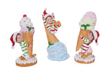 Three ice cream cone-shaped figurines with characters on a white background