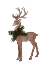 Decorative deer figure with antlers and a wreath on a white background