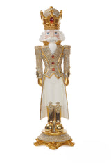 Decorative figurine of a king with gold and white attire on a white background