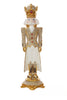 Decorative figurine of a king with gold and white attire on a white background