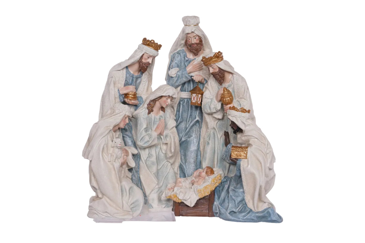 Nativity scene figurine set on a white background