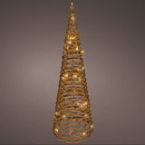 Decorative gold cone-shaped object with lights on a gray background