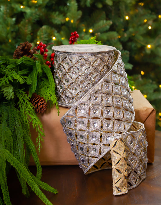 Decorative ribbon with a lattice pattern in front of a Christmas tree.