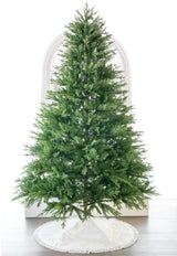 Decorative Christmas tree with a white base on a white background