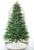 Decorative Christmas tree with a white base on a white background