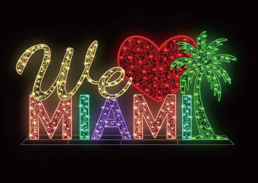 Colorful 'We Love Miami' sign with a heart and palm tree on a black background