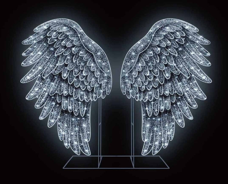 Decorative angel wings with LED lights on a black background