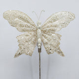 Set de 6 mariposas de 9" en purpurina color marfil
