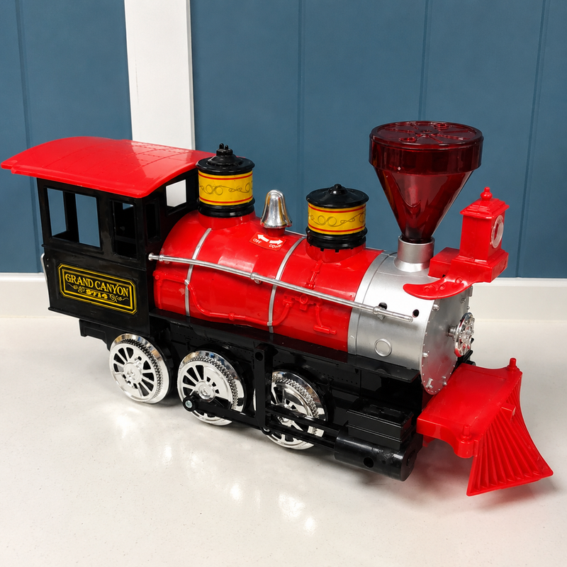 Toy train with red and black design on a white surface