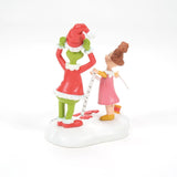 Grinch Village Being Fitted For A Santy Suit