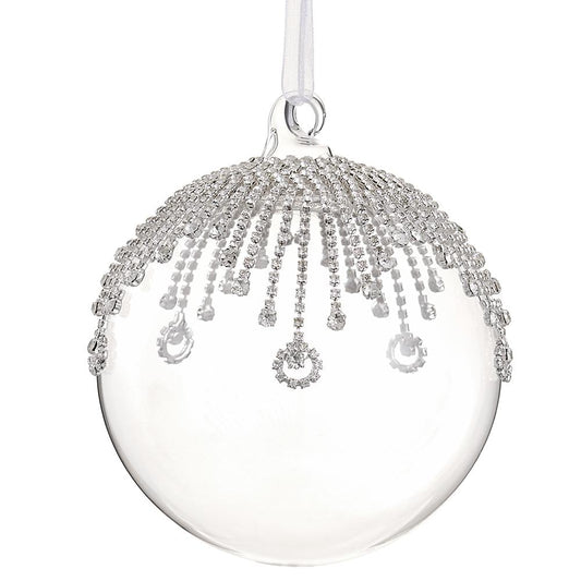 Clear Christmas ball ornament with silver embellishments on a white background