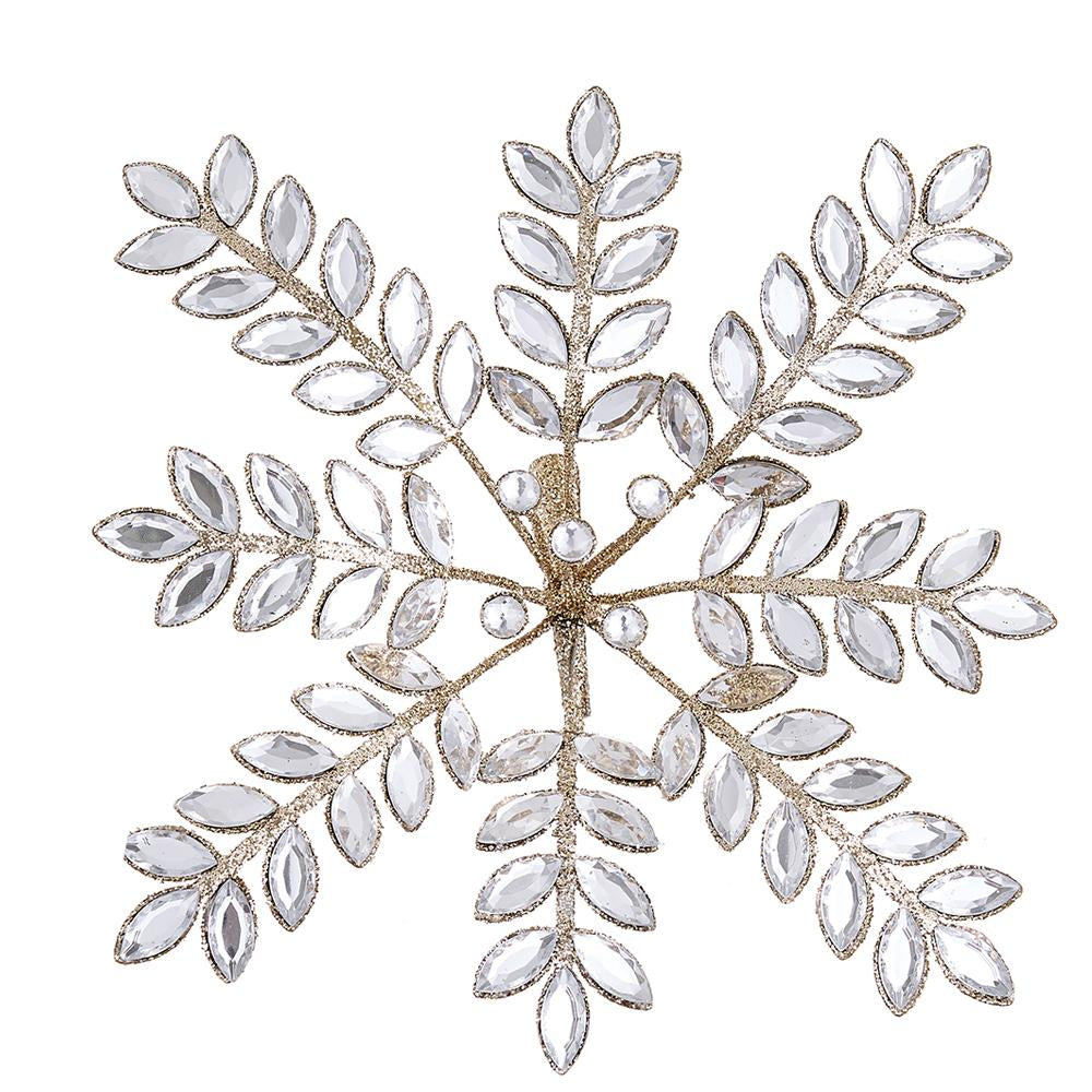 Decorative snowflake with white stones and gold accents on a white background