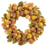 Decorative wreath with autumnal fruits and leaves on a white background
