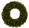 Green Christmas wreath with lights on a white background