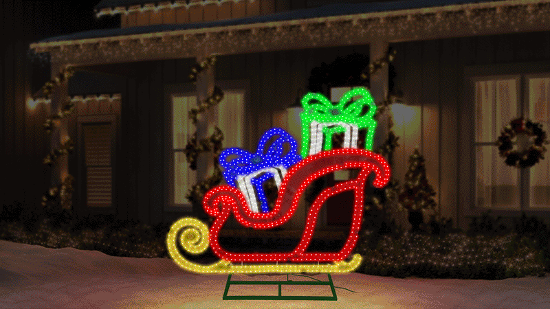 Decorative Christmas light display of a sleigh with presents against a dark background.