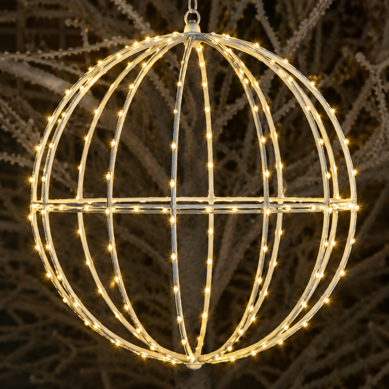 Decorative light sphere with string lights against a natural background
