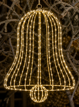 Decorative light fixture shaped like a bell with a dark background
