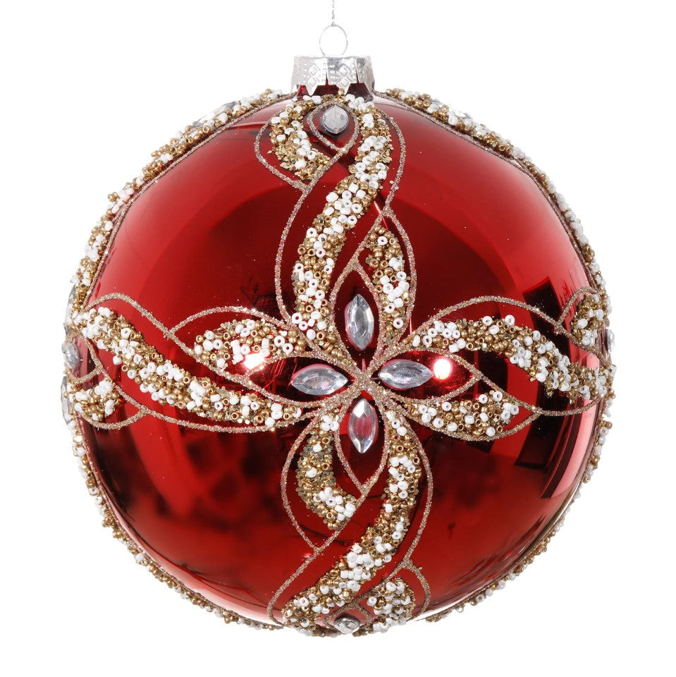 Red Christmas ornament with gold and silver decorations on a white background