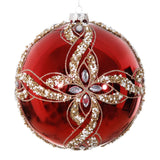 Red Christmas ornament with gold and silver decorations on a white background