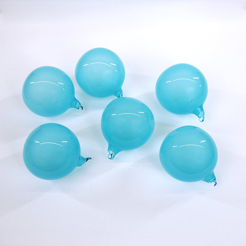 Caja de 6 adornos de cristal color chicle turquesa de 3"