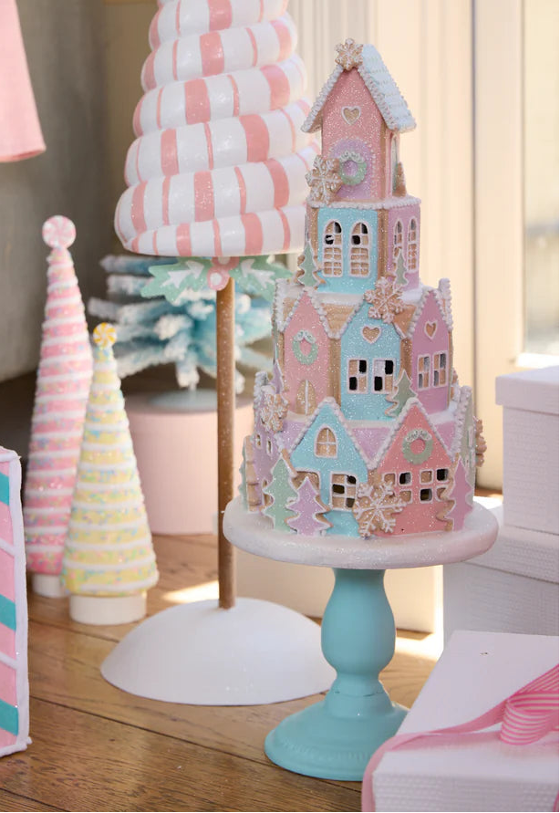 23" LED Pink & Blue Gingerbread Village On Pedestal Battery Operated