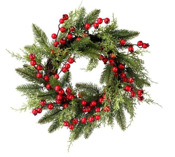 Christmas wreath with greenery and red berries on a white background